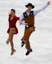 Emily Samuelson (L) and Evan Bates of the U.S. perform during the ice dance original dance figure skating competition at the Vancouver 2010 Winter Olympics February 21, 2010. REUTERS/David Gray/File Photo
