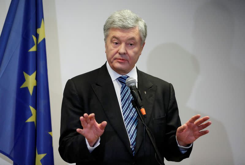 Ukrainian former President Poroshenko gives a news conference in Warsaw