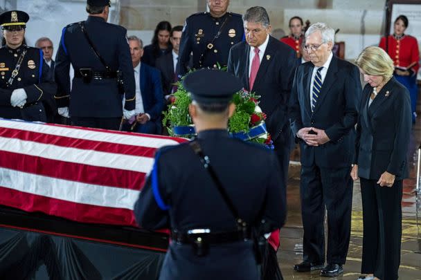 PHOTO: Sen. Joe Manchin, Senate Minority Leader Mitch McConnell , and Sen. Shelley Moore Capito pay respects to Hershel Woodrow  'Woody ' Williams, in the U.S. Capitol Rotunda as his remains lie in honor on July 14, 2022 in Washington, D.C. (Pool/Getty Images)