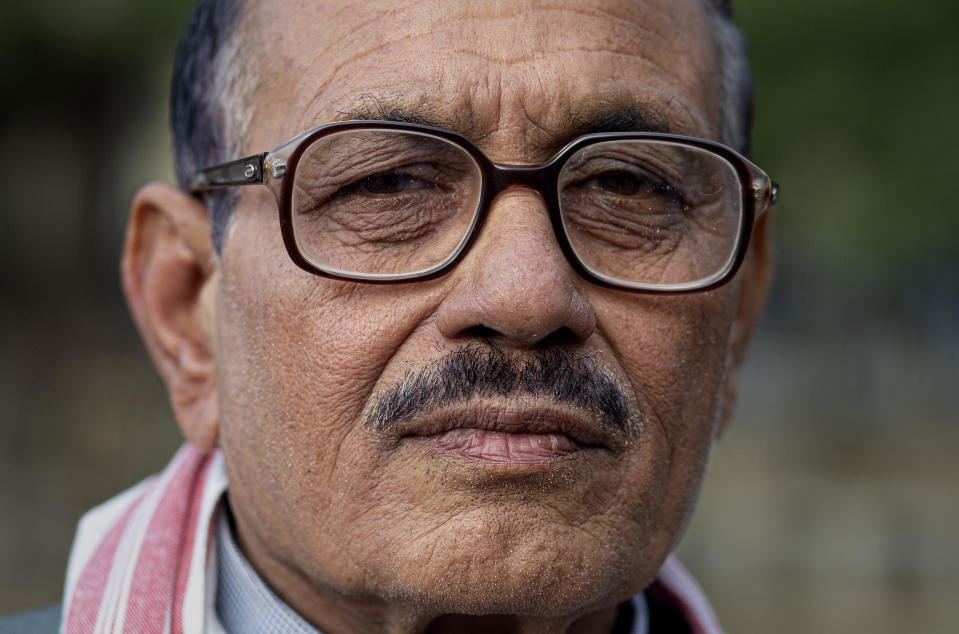 In this Monday, Dec. 23, 2019, photo, Lokeswar Bora, 72, participates in a protest against the Citizenship Amendment Act in Gauhati, India. Tens of thousands of protesters have taken to India’s streets to call for the revocation of the law, which critics say is the latest effort by Narendra Modi’s government to marginalize the country’s 200 million Muslims. Bora said the Act was unacceptable and demanded that the Indian Prime Minister Narendra Modi withdraw it immediately. (AP Photo/Anupam Nath)