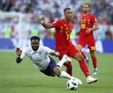 <p>Danny Rose collides with Yannick Carrasco </p>