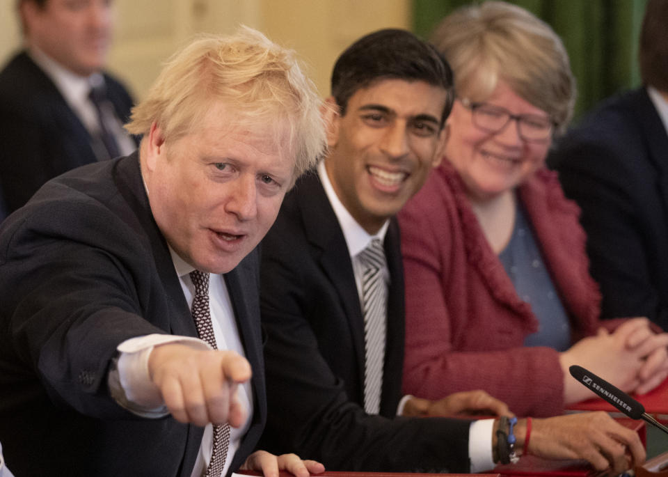 File photo dated 14/02/20 showing Prime Minister Boris Johnson (left), alongside new Chancellor of the Exchequer Rishi Sunak (centre), and Work and Pensions Secretary Therese Coffey (right) during the first Cabinet meeting at 10 Downing Street, London, since the reshuffle.