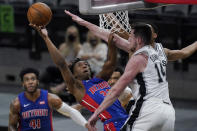 Detroit Pistons guard Saben Lee (38) shoots against San Antonio Spurs forward Drew Eubanks (14) during the second half of an NBA basketball game in San Antonio, Thursday, April 22, 2021. (AP Photo/Eric Gay)