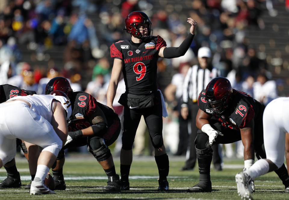 San Diego State quarterback Ryan Agnew (9) signals before the snap during the first half of the New Mexico Bowl NCAA college football game against Central Michigan on Saturday, Dec. 21, 2019 in Albuquerque, N.M. (AP Photo/Andres Leighton)