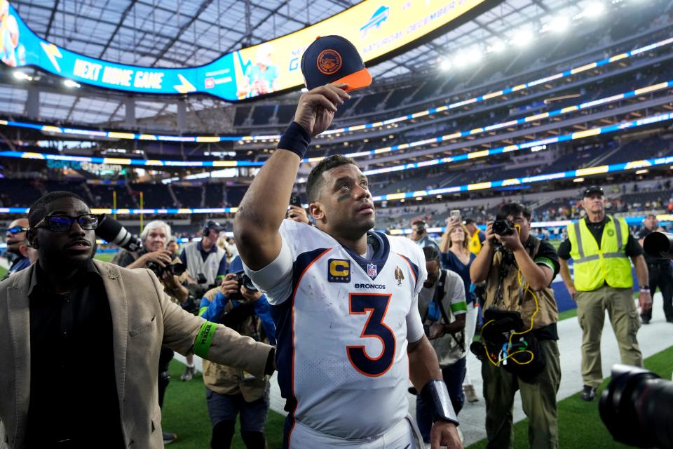 Denver Broncos quarterback Russell Wilson (3) acknowledges the fans as he leaves the field after the team's NFL football game against the Los Angeles Chargers Sunday, Dec. 10, 2023, in Inglewood, Calif.