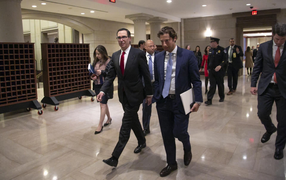 Treasury Secretary Steven Mnuchin departs the Capitol after giving a classified briefing to members of the House of Representatives and telling them the Trump administration will keep strict U.S. sanctions on the Russian oligarch Oleg Deripaska, in Washington, Thursday, Jan. 10, 2019. (AP Photo/J. Scott Applewhite)