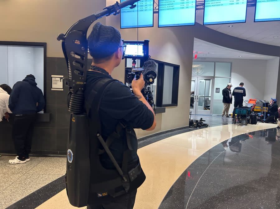 Members of the media entering court for the opening statements of the Kaitlin Armstrong murder trial on Wednesday, Nov. 1, 2023. (KXAN Photo/Frank Martinez)