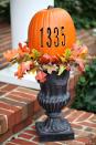 <p>Let your neighbors and trick-or-treaters know just how serious you are about Halloween with this pumpkin, customized with your home address. </p><p><em><a href="https://inmyownstyle.com/finding-fall-home-tour.html" rel="nofollow noopener" target="_blank" data-ylk="slk:Get the tutorial at In My Own Style »;elm:context_link;itc:0;sec:content-canvas" class="link ">Get the tutorial at In My Own Style »</a></em> </p>