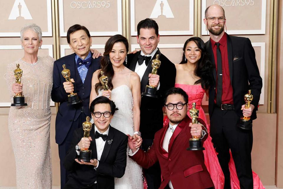 <p>Alamy</p> (Left-right:) Jamie Lee Curtis, James Hong, Ke Huy Quan, Michelle Yeoh, Jonathan Wang, Dan Kwan, Stephanie Hsu and Daniel Scheinert at the 2023 Academy Awards