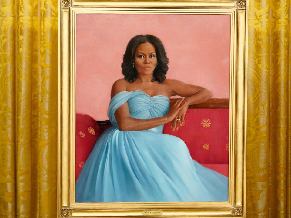 The official White House portrait of first lady Michelle Obama painted by Sharon Sprung.
