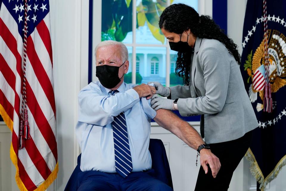 President Joe Biden receives a third shot of the Pfizer Covid-19 vaccine