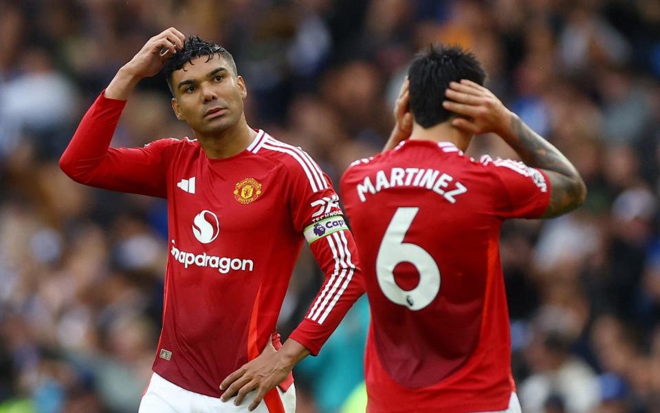 Manchester United's Casemiro scratches his head after his side's defeat to Brighton, August 24, 2024