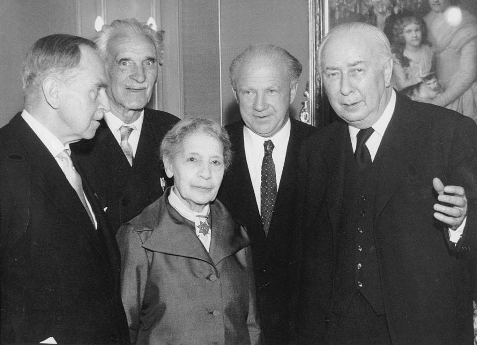 Left to right: Otto Hahn, Dr. Hartmann, Lise Meitner, Werner Heisenberg, and Theodor Heuss