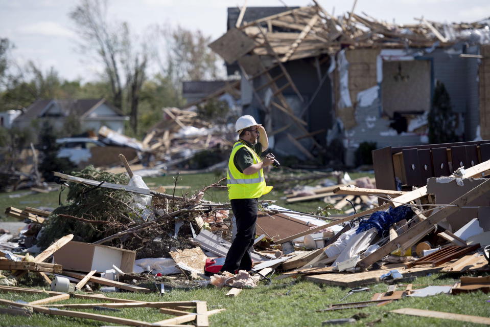 <p>An environment scientist surveys damage left after a tornado hit the community of Dunrobin, Ont., west of Ottawa on Saturday, Sept. 22, 2018. (Photo from Justin Tang/The Canadian Press) </p>