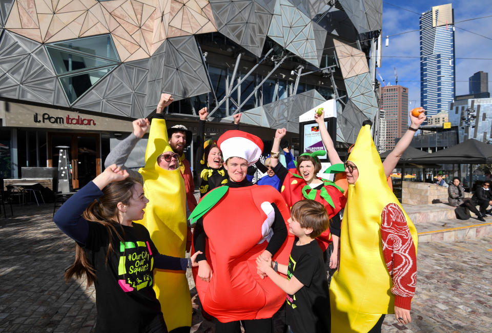 Demonstrators protest against plans to build an Apple Store at Federation Square, in Melbourne, Saturday, August 4, 2018. (AAP Images/Penny Stephens)