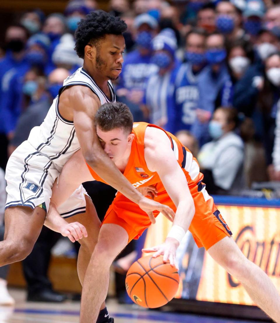 Duke’s Jeremy Roach (3) pressures Syracuse’s Joseph Girard III (11) during the first half of Duke’s game against Syracuse at Cameron Indoor Stadium in Durham, N.C., Saturday, Jan. 22, 2022.