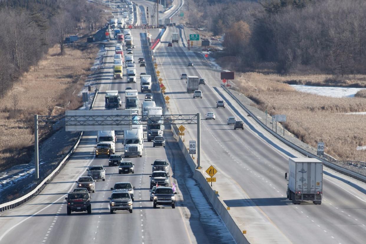 The Ontario government says its proposed ban on highway tolls will be part of an omnibus bill to be introduced next week. (Lars Hagberg/Canadian Press - image credit)