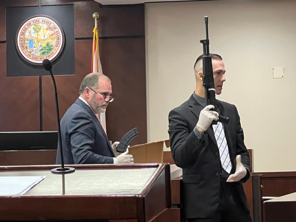 Tallahassee Police Department Sgt. Jesse Goram displays for jurors a rifle suspected of being involved in a mass shooting on Pensacola Street on October 29 during the trial of De'Arius Cannon. The rifle was recovered during a traffic stop of other co-defendants in the case.