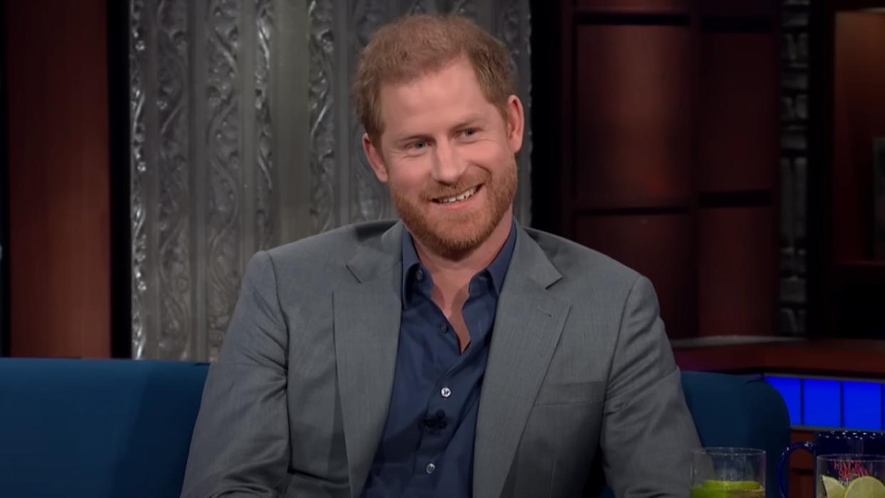  Prince Harry smiling on the Stephen Colbert's Show. 