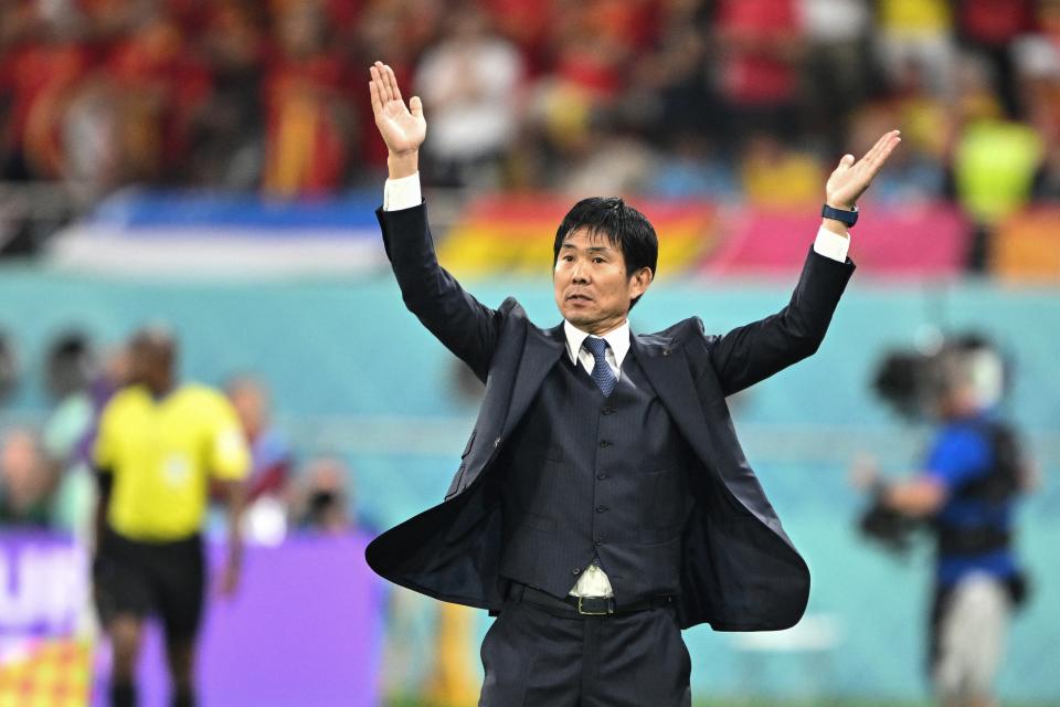 Japan's coach #00 Hajime Moriyasu celebrates at the end the Qatar 2022 World Cup Group E football match between Japan and Spain at the Khalifa International Stadium in Doha on December 1, 2022. (Photo by Philip FONG / AFP) (Photo by PHILIP FONG/AFP via Getty Images)