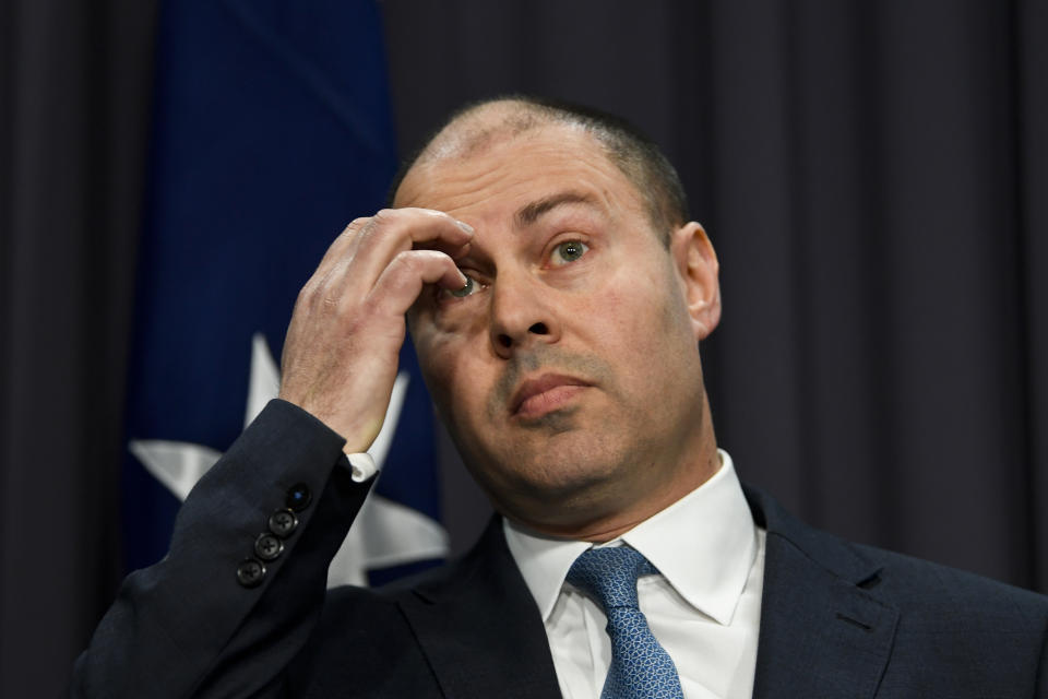 Australian Federal Treasurer Josh Frydenberg hands down the Mid-Year Economic and Fiscal Outlook 2019/20 at Parliament House in Canberra, Monday, December 16, 2019. (AAP Image/Lukas Coch)