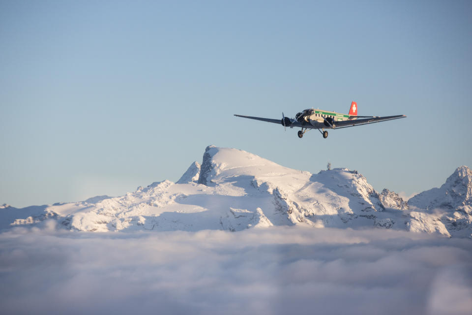 HANDOUT - Undated pic of a JU-52 aircraft of the JU-AIR in the air. A JU-52 of the JU-AIR crashed on Saturday afternoon, 04 August 2018 at Piz Segnas above Flims, Switzerland. Swiss police say all 20 people aboard an old-time propeller plane were killed when the aircraft crashed into a mountainside in southeast Switzerland. (JU-AIR/Keystone via AP)