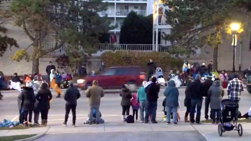 The City of Waukesha&#39;s livestream video of the Waukesha Christmas Parade shows a burgundy SUV that drove onto the parade route and struck a number of people.