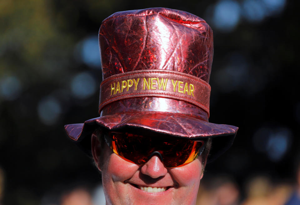 <p>A spectator waits for the annual new year fireworks as part of celebrations on Sydney Harbour, Australia, December 31, 2017. (Photo: David Gray/Reuters) </p>