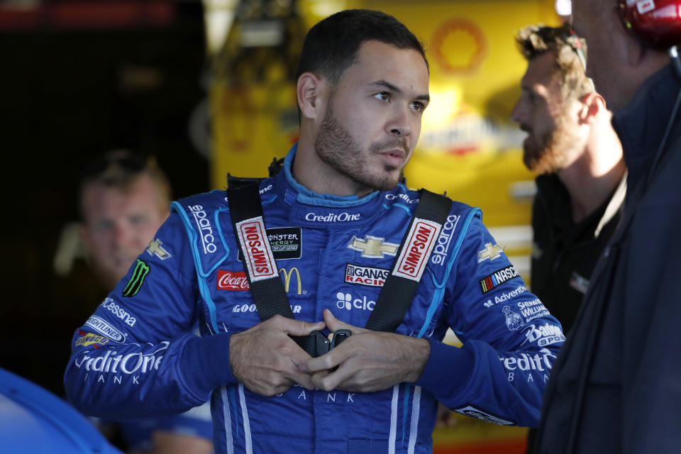 Kyle Larson suits up for practice for the NASCAR Cup Series auto race at Kansas Speedway in Kansas City, Kan., Friday, Oct. 18, 2019. (AP Photo/Colin E. Braley)