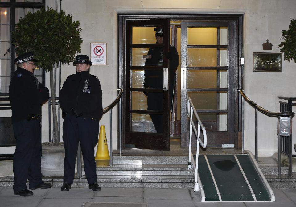 Police officers stand guard outside the King Edward VII hospital, in central London, Friday, Dec. 7, 2012. King Edward VII hospital says a nurse involved in a prank telephone call to elicit information about the Duchess of Cambridge has died. The hospital said Friday that Jacintha Saldanha had been a victim of the call made by two Australian radio disc jockeys. They did not immediately say what role she played in the call. (AP Photo/Lefteris Pitarakis)