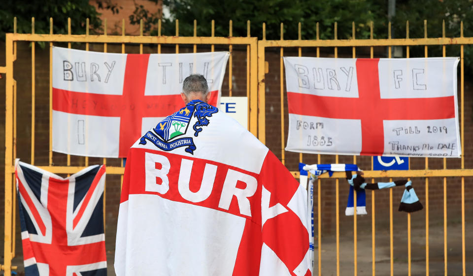 A Bury fan at the gates of Gigg Lane, Bury. C&N Sporting Risk is unable to proceed with the proposed takeover of Bury, the data analytics company has announced. (Photo by Peter Byrne/PA Images via Getty Images)