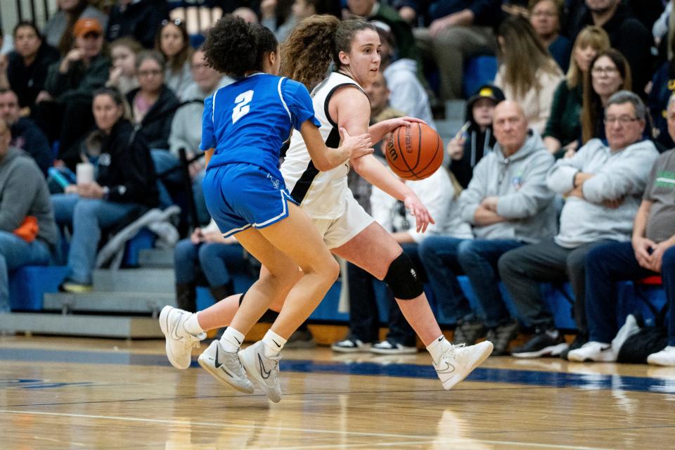 Feb 3, 2024; Demarest, NJ, USA; (From left) T #2 Shaely Espinal and RD #4 Morgan Sconza. Teaneck goes up against River Dell in the girls basketball Bergen County Tournament quarterfinals at Northern Valley Regional High School on Saturday.