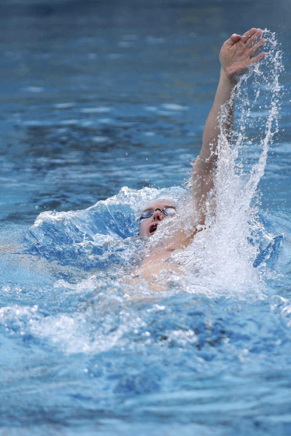 Ryan Murphy swims during a training session Tuesday, Feb. 13, 2024, in Berkeley, Calif. Ryan Murphy longs to reclaim the top spot on the medal podium at the Paris Olympics. (AP Photo/Jed Jacobsohn)