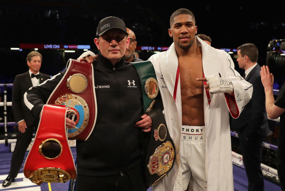 Anthony Joshua with his trainer Rob McCracken. (Credit: Getty Images)