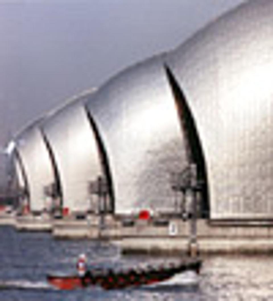 The Thames Barrier spans a 520-metre section of the River Thames, close to Greenwich and London City Airport