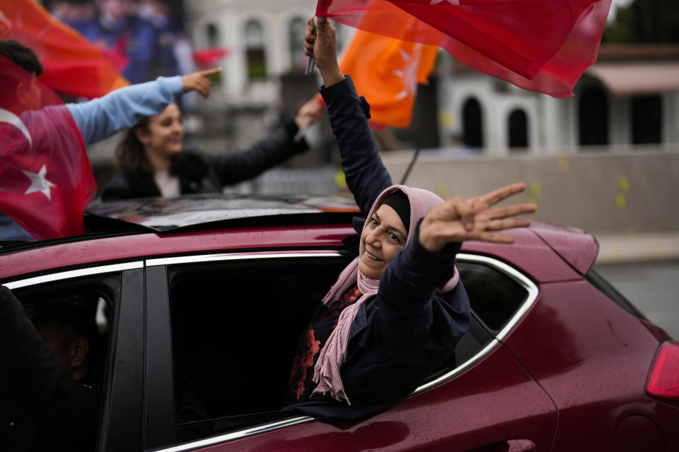 Supporters of President Recep Tayyip Erdogan celebrate outside his residence in Istanbul, Turkey, Sunday, May 28, 2023. Turkey's incumbent President Recep Tayyip Erdogan has declared victory in his country's runoff election, extending his rule into a third decade. (AP Photo/Francisco Seco)