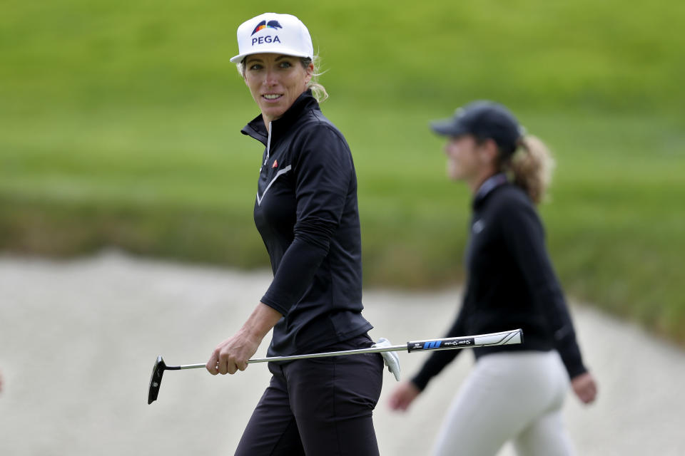 Mel Reid, of England, walks off the course after finishing the first round of the U.S. Women's Open golf tournament at The Olympic Club, Thursday, June 3, 2021, in San Francisco. (AP Photo/Jed Jacobsohn)