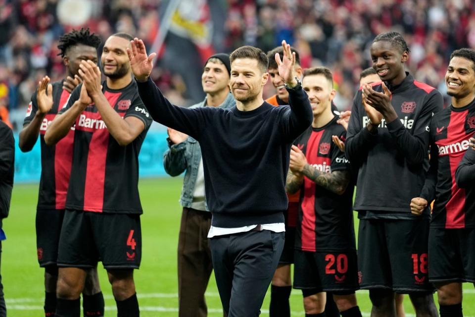 Bayer Leverkusen coach Xabi Alonso was a key player in Bayern Munich’s most successful era but is set to end their 11-year stint as Bundesliga champions (AP)