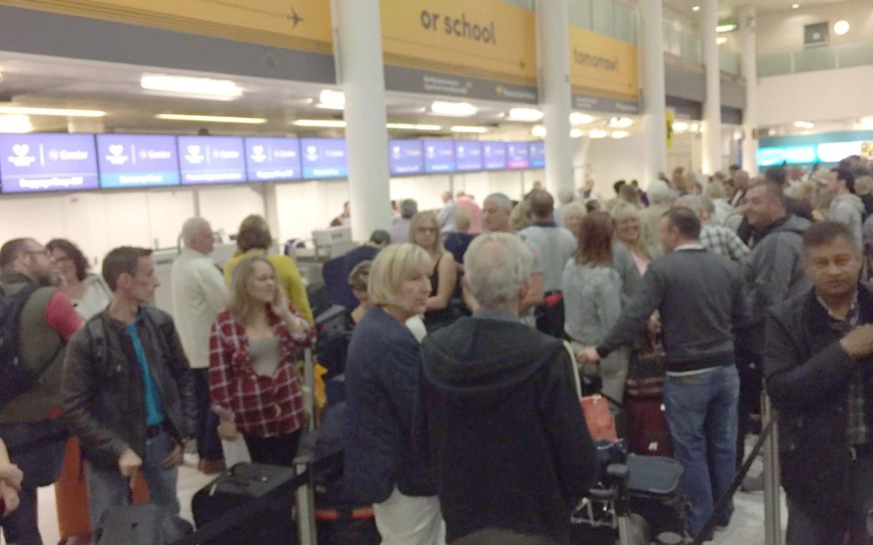 Long queues at the Thomas Cook check-in desks at Gatwick Airport on Thursday morning - Jerry Gandhi/Twitter