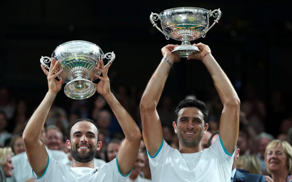 Colombia's Juan Sebastian Cabal and Robert Farah celebrate after they beat Nicolas Mahut and Edouard Roger-Vasselin of France to claim the Wimbledon Men's Doubles title.  - REX