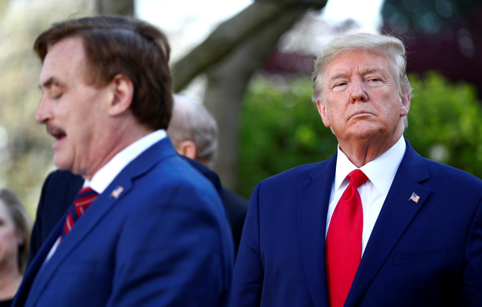 My Pillow CEO Michael Lindell speaks as U.S. President Donald Trump listens during the daily coronavirus (COVID-19) response briefing in the Rose Garden at the White House in Washington, U.S., March 30, 2020. REUTERS/Tom Brenner