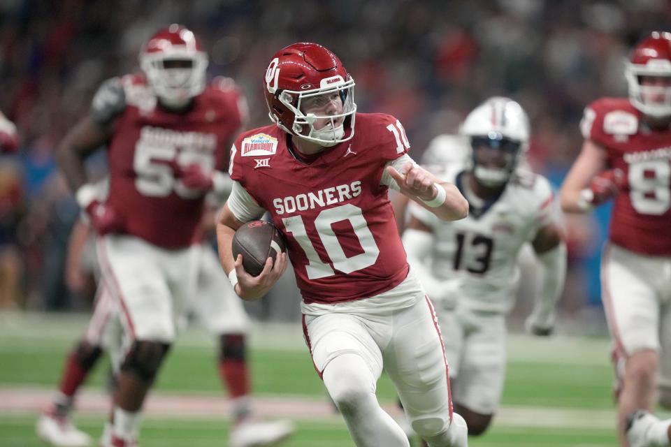 OU quarterback Jackson Arnold carries the ball against Arizona in the first half of the Alamo Bowl on Dec. 28 at the Alamodome in San Antonio.