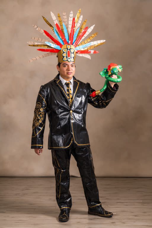 Ian Hernandez in black and gold duct tape tuxedo inspired by El Salvadorian roots. (Photo via Stuck At Prom)