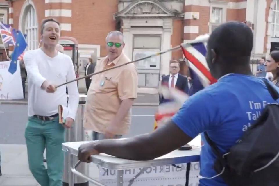 King's College London probe after senior lecturer in mental health filmed 'poking Remain campaigner with Union Jack flag'