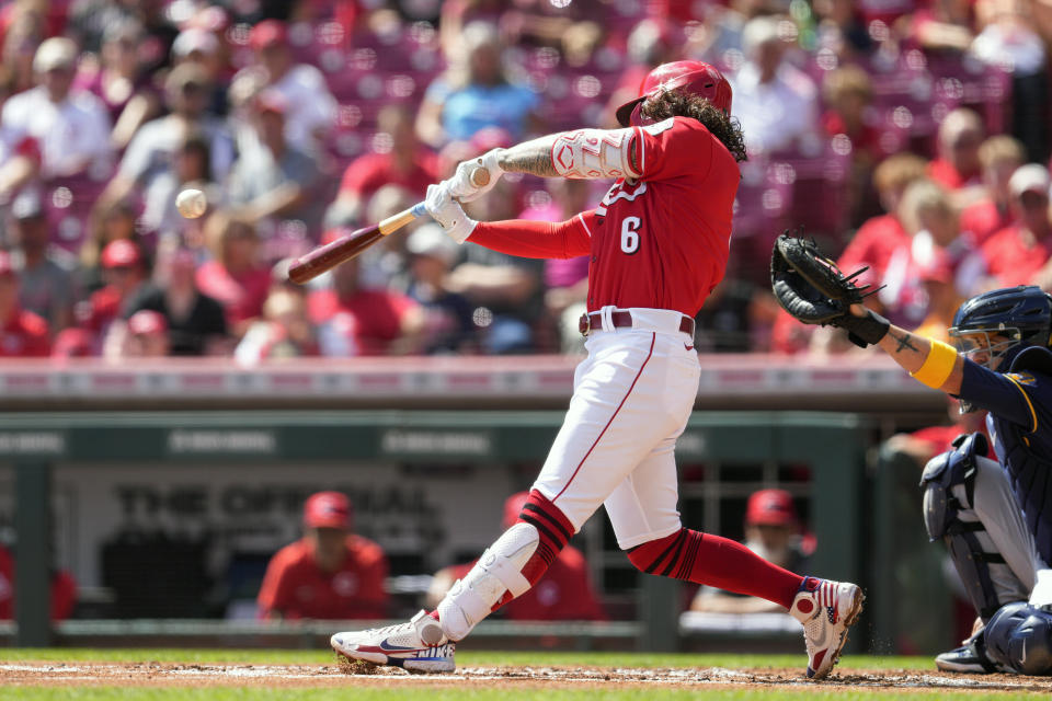 Cincinnati Reds' Jonathan India (6) hits a single during the first inning of a baseball game against the Milwaukee Brewers Sunday, Sept. 25, 2022, in Cincinnati. (AP Photo/Jeff Dean)