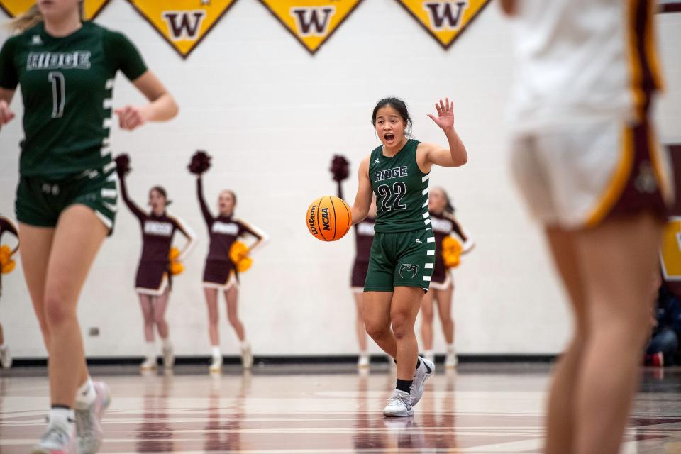 Fossil Ridge's Natalie Lin calls out a play during a game against Windsor High School in Windsor, Colo., on Thursday Dec. 14, 2023.