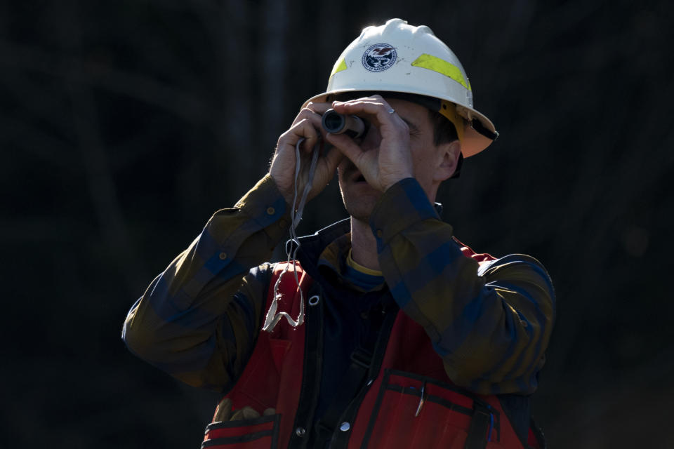 Washington State Department of Natural Resources geologist Mitch Allen visits the site of a landslide in the Capitol Forest, Thursday, March 14, 2024, in Olympia, Wash. (AP Photo/Jenny Kane)