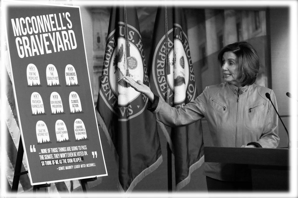 House Speaker Nancy Pelosi with a chart referencing Senate Majority Leader Mitch McConnell and the Republican-controlled Senate in June. (Photo: Jonathan Ernst/Reuters; digitally enhanced by Yahoo News)