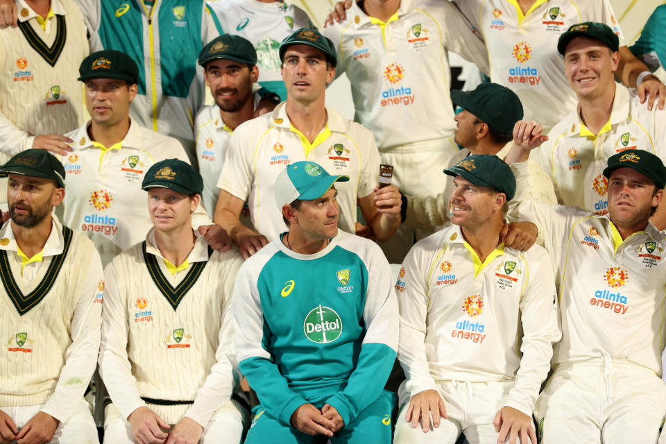 Pictured bottom centre, former Australia coach Justin Langer and his Ashes-winning Test squad in 2022.