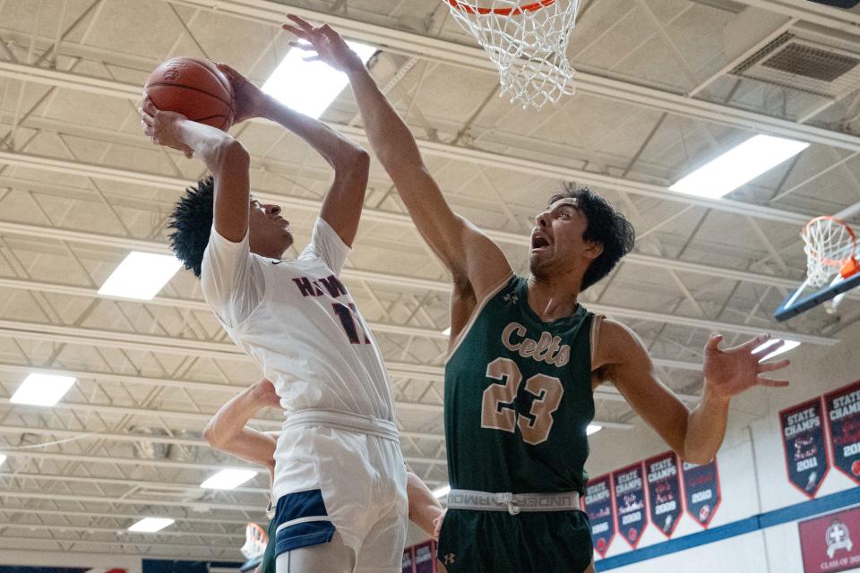 Hartley's Ethan Godfrey attempts a shot against Dublin Jerome's Veer Shah on Dec. 20.